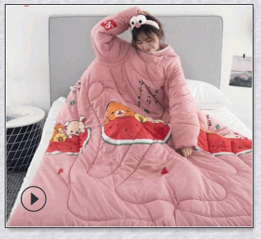 Wearable winter blanket with sleeves for cozy comfort and productivity