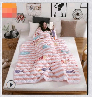 Wearable winter blanket with sleeves for cozy comfort and productivity