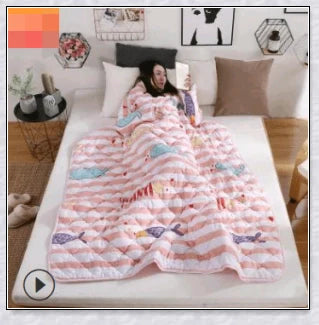 Wearable winter blanket with sleeves for cozy comfort and productivity
