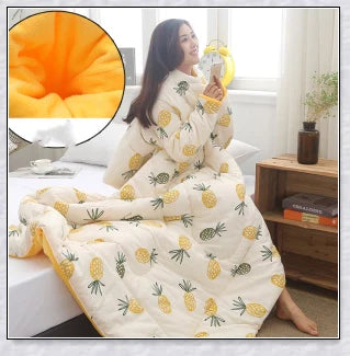 Wearable winter blanket with sleeves for cozy comfort and productivity