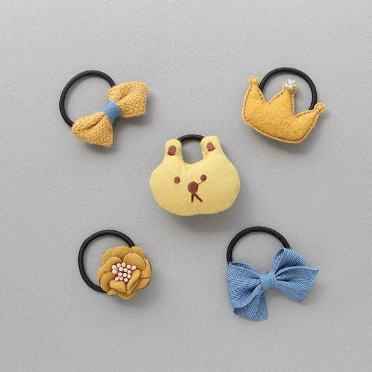 Colorful and stylish hair accessories for dogs, including bows and clips in various shades to complement your furry friend's unique personality.