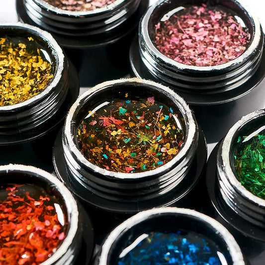 Dried Flower Gel Nail Polish in pink color with real dried flowers embedded in the gel formula