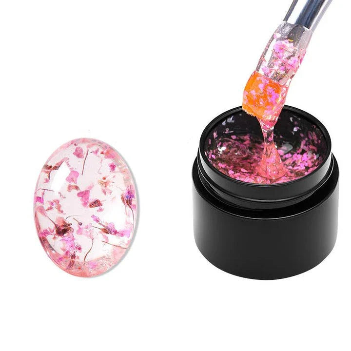 Dried Flower Gel Nail Polish in pink color with real dried flowers embedded in the gel formula