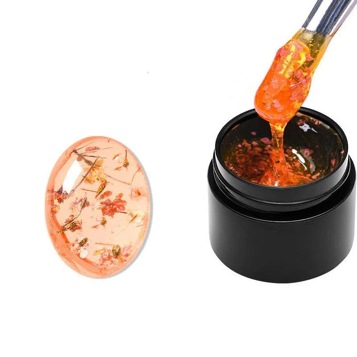 Dried Flower Gel Nail Polish in pink color with real dried flowers embedded in the gel formula