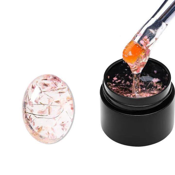Dried Flower Gel Nail Polish in pink color with real dried flowers embedded in the gel formula