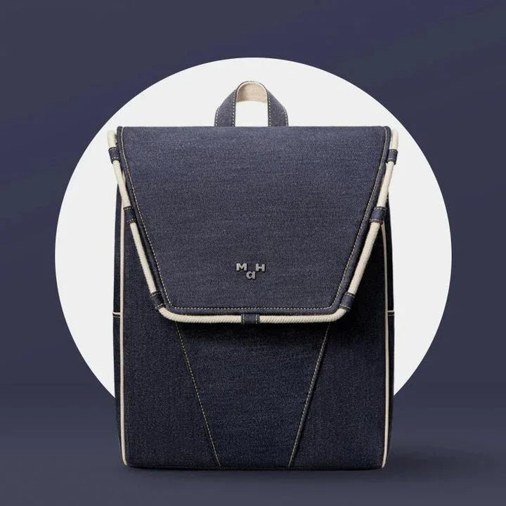 Eco-Friendly Active Denim Waterproof Backpack with multiple interior pockets, waterproof lining, and comfortable hard handle