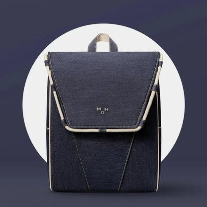 Eco-Friendly Active Denim Waterproof Backpack with multiple interior pockets, waterproof lining, and comfortable hard handle