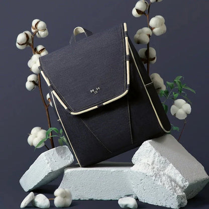 Eco-Friendly Active Denim Waterproof Backpack with multiple interior pockets, waterproof lining, and comfortable hard handle