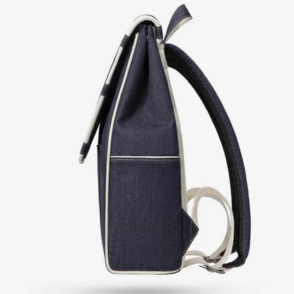 Eco-Friendly Active Denim Waterproof Backpack with multiple interior pockets, waterproof lining, and comfortable hard handle