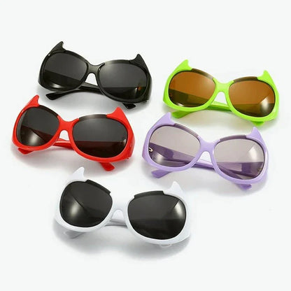 Stylish cat-eye sunglasses with oversized frames, semi-rimless design, and punk-inspired detailing for a timeless, glamorous look