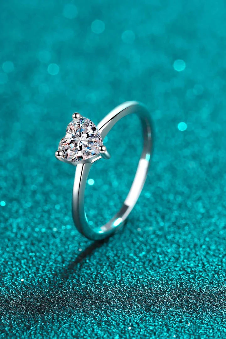 Elegant heart-shaped moissanite solitaire ring in 925 sterling silver with a sleek, modern design