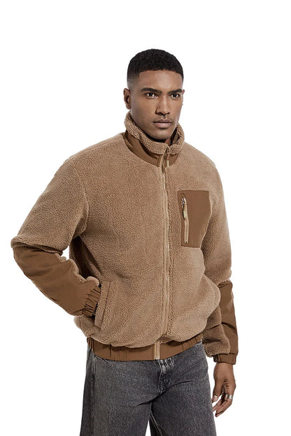 A cozy and stylish men's fleece jacket with a standing collar and convenient side pockets, available in a range of classic colors.
