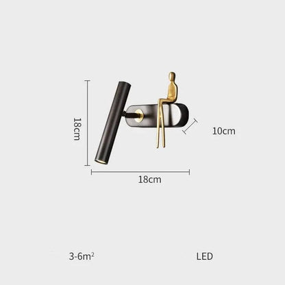 Stylish and versatile bedroom wall lamp with a sleek, postmodern design and a luxurious gold finish