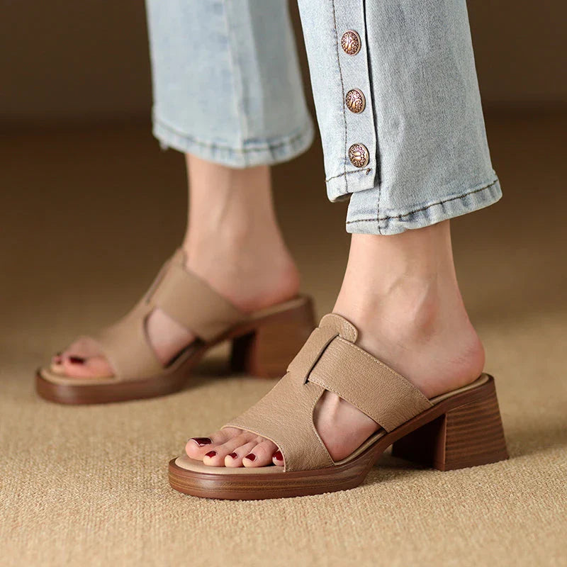 Women's Leather Peep Toe High Heel Sandals in Black, featuring genuine leather upper, sheepskin lining, and stylish square heel design