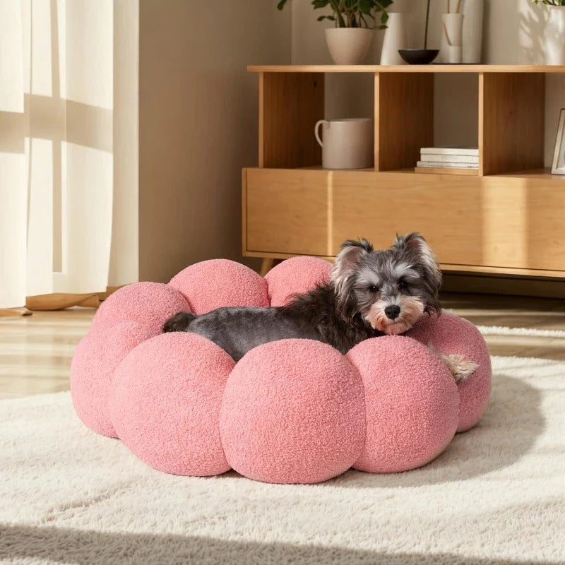 A cozy, flower-shaped dog bed made of soft, plush teddy sherpa fabric with raised edges for head and neck support, providing a calming and comfortable resting spot for medium-sized dogs.