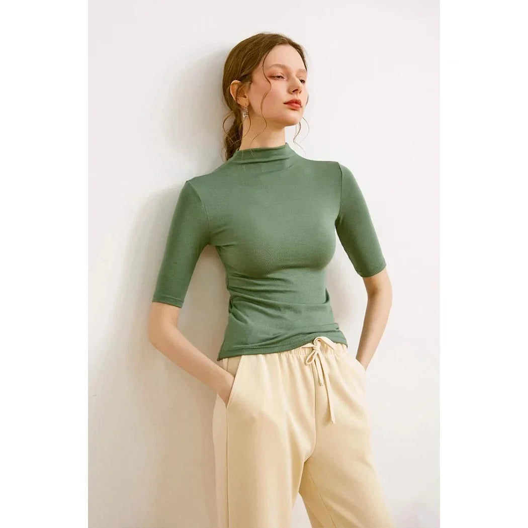 Women's Mock Neck Wool Blend T-Shirt in Pink by Trendha, featuring a sleek silhouette and classic design for elegant, comfortable wear.