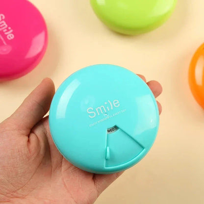 Compact Portable Travel Pill Organizer with seven labeled compartments for organizing daily medications and supplements