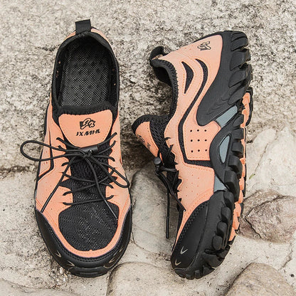 Couple wearing breathable mesh hiking shoes while exploring outdoor trails