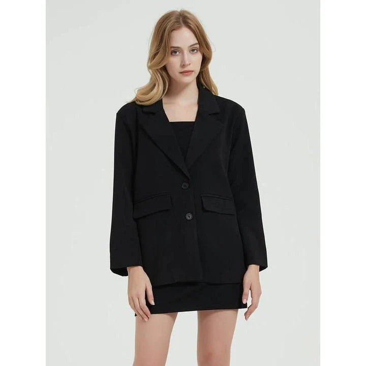 Elegant women's black blazer coat with a turn-down collar, single-breasted closure, and practical pockets for a polished, professional look.