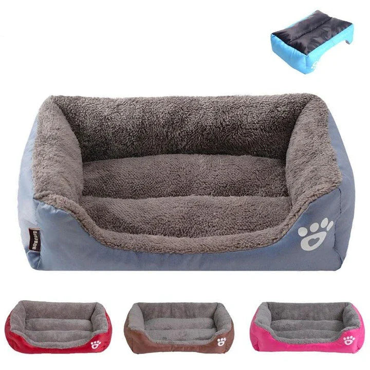 A plush, green pet bed with a paw-print pattern, designed to provide cozy and waterproof comfort for pets.