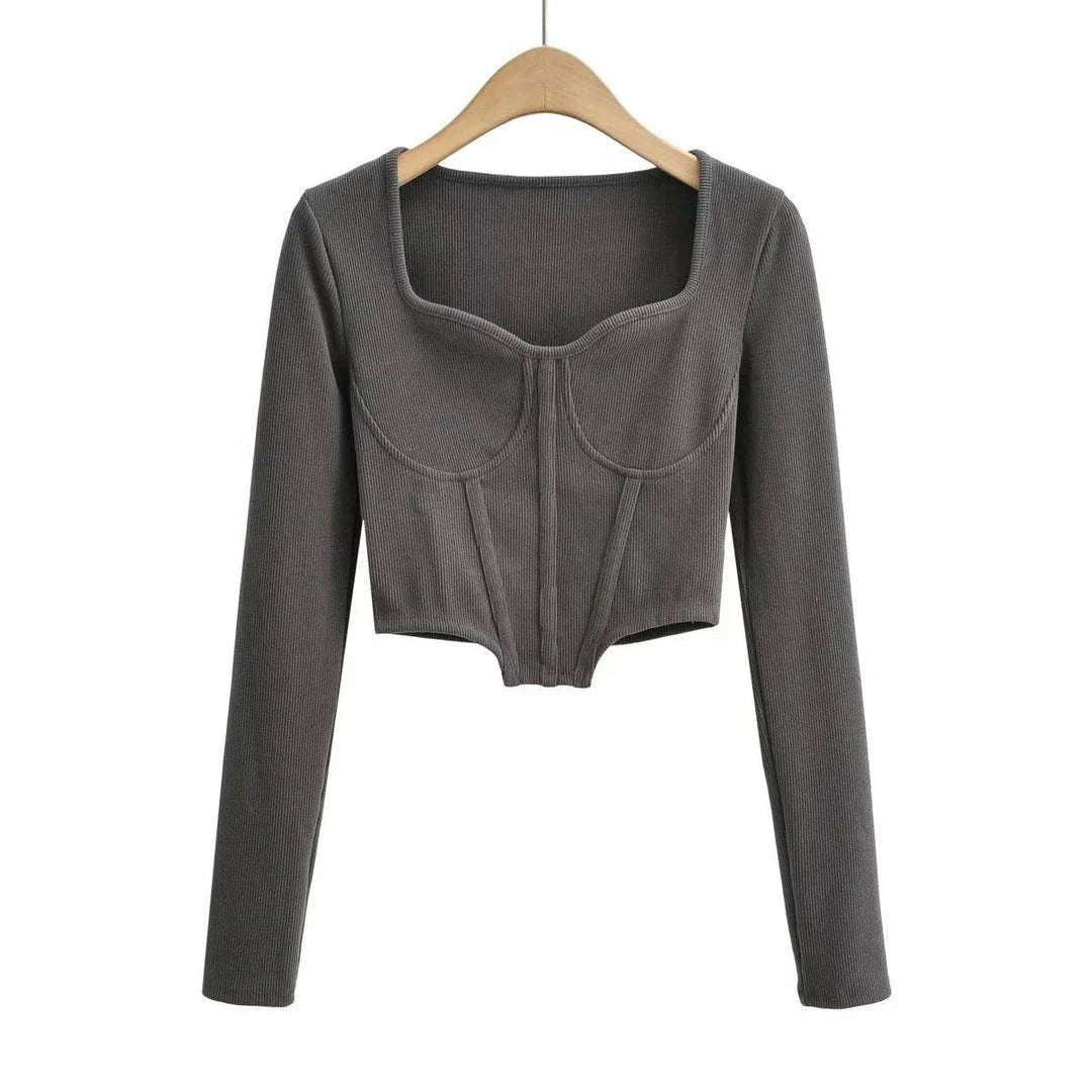 A stylish slim-fit short autumn top with an open waist design, made of premium polyester fabric with long sleeves and a square collar.