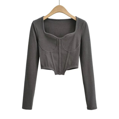 A stylish slim-fit short autumn top with an open waist design, made of premium polyester fabric with long sleeves and a square collar.