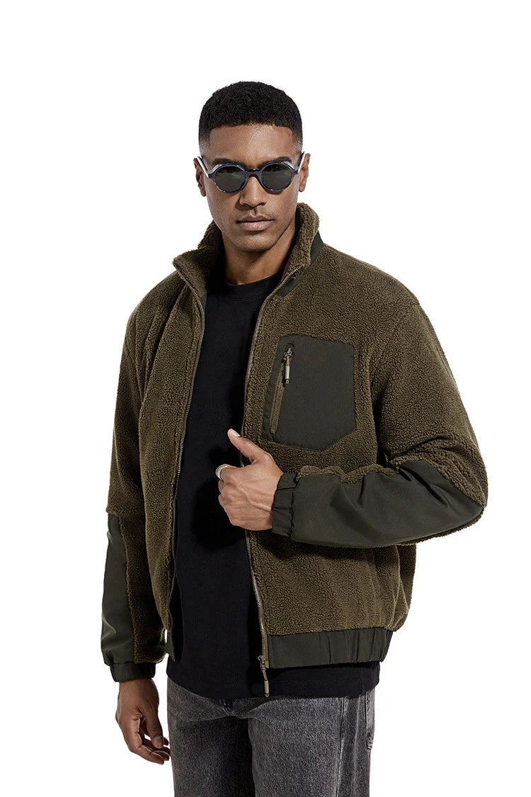 A cozy and stylish men's fleece jacket with a standing collar and convenient side pockets, available in a range of classic colors.