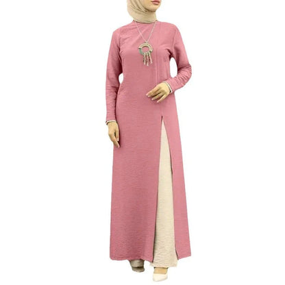 Elegant polyester dress with long sleeves, high slit hem, and available in caramel, black, blue, green, and pink colors