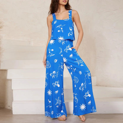 A stylish wide-leg jumpsuit with a paisley print design and a suspender top, perfect for women's casual and streetwear fashion.