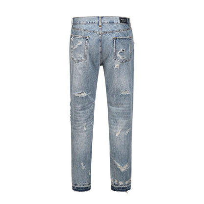 Premium distressed denim jeans with ripped detailing, perfect for casual streetwear style