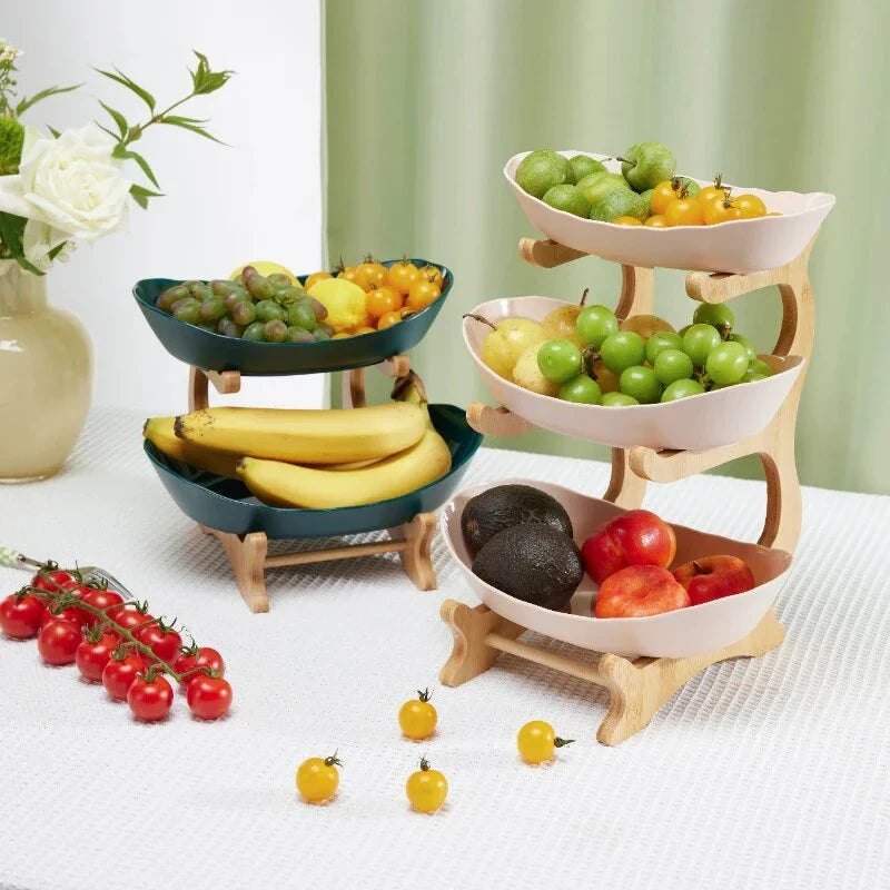 Three-tier plastic and bamboo fruit display tray with unique leaf-shaped design, available in white, beige, and green colors