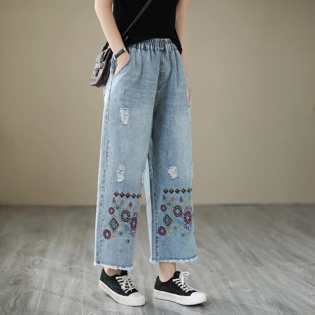 Fashionable embroidered ripped denim straight jeans with a relaxed yet flattering silhouette