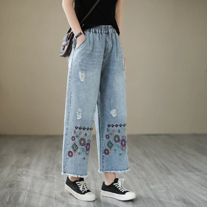 Fashionable embroidered ripped denim straight jeans with a relaxed yet flattering silhouette