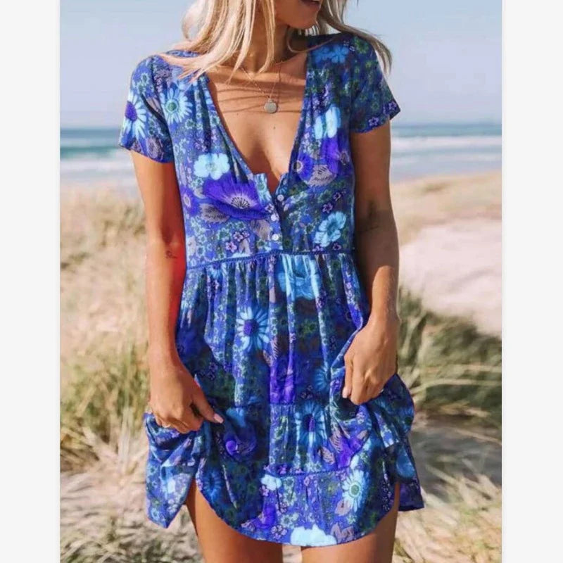 A stylish women's dress with a vibrant printed pattern, V-neck, and short sleeves.