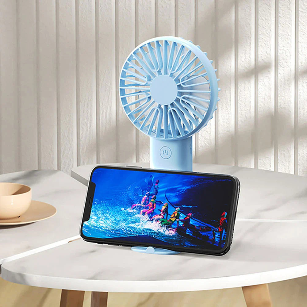 Compact USB Rechargeable Mini Handheld Fan with 3 wind modes, desktop stand, and phone holder for cooling anywhere