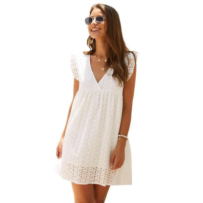 Elegant white lace casual dress with a flattering silhouette and feminine details