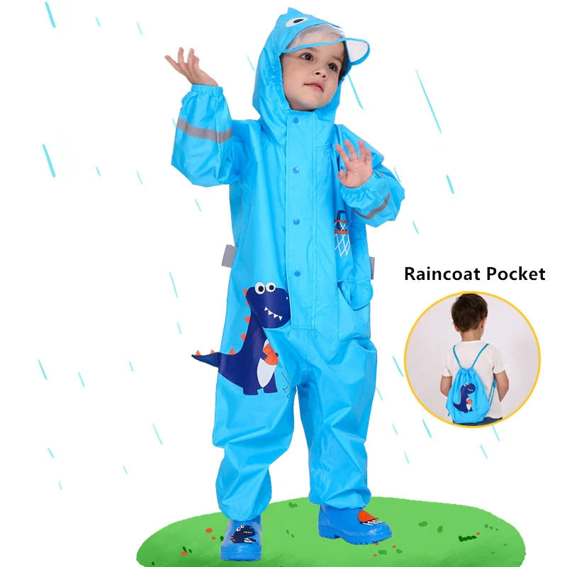 Children in a colorful dinosaur-themed waterproof rain jumpsuit playing outdoors in the rain