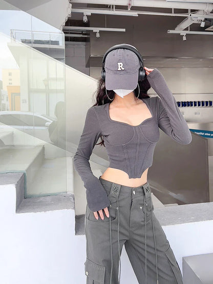 A stylish slim-fit short autumn top with an open waist design, made of premium polyester fabric with long sleeves and a square collar.