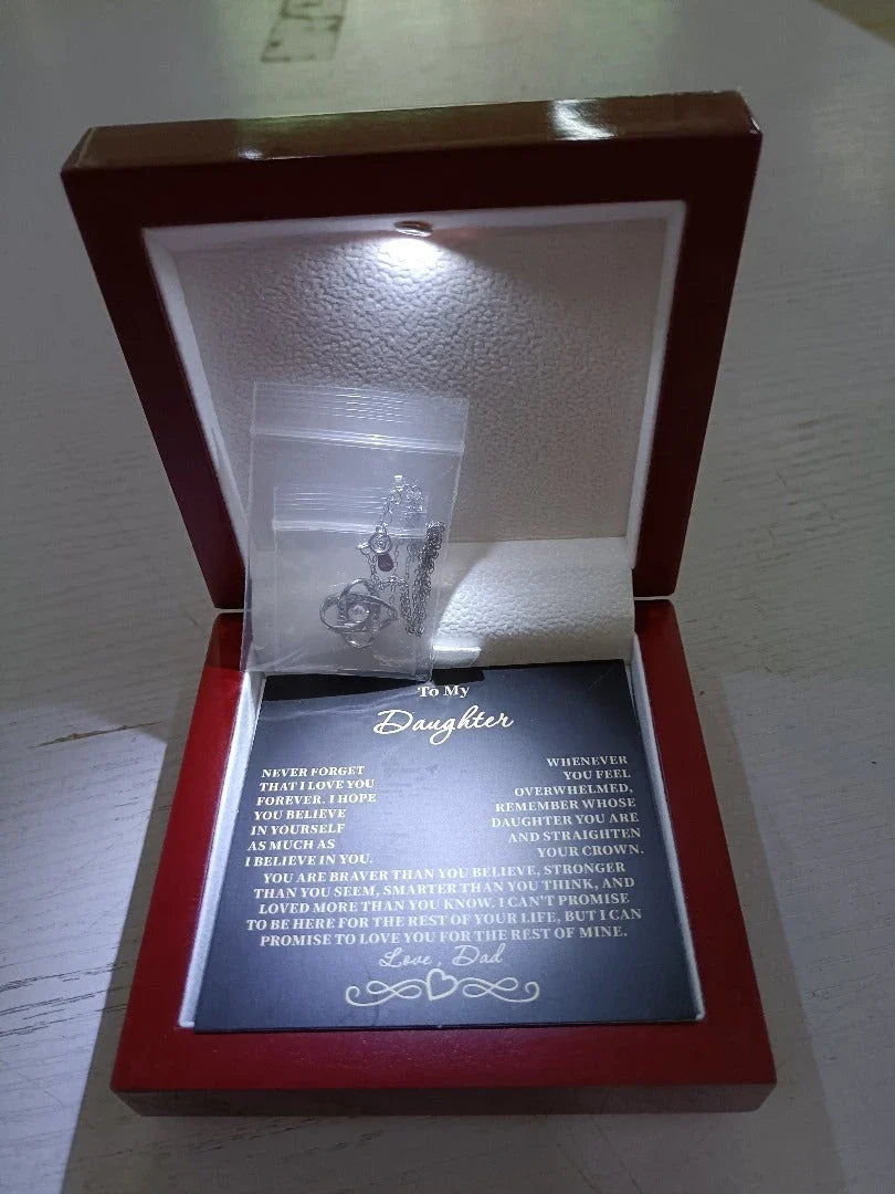 A dazzling diamond-accented star pendant necklace made of 925 sterling silver with a delicate clavicle chain, making a thoughtful holiday gift for her.