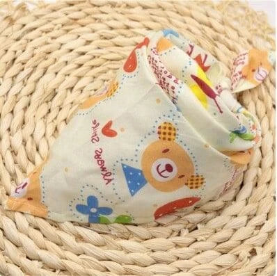 Adorable Cartoon Patterned Triangular Dog Scarf in vibrant colors, perfect for keeping your pup warm and stylish