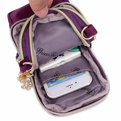 Fashionable women's crossbody phone bag with multi-function pockets and headphone plug for hands-free music access
