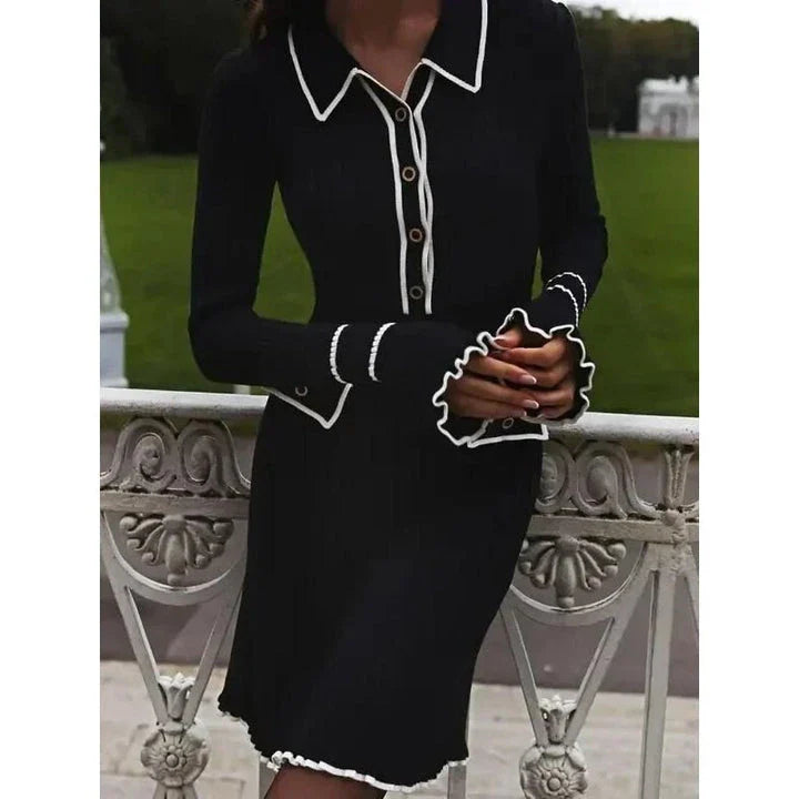 Elegant ruffled knit mini dress in black with high stretch fabric and patchwork pattern for a sophisticated and comfortable look