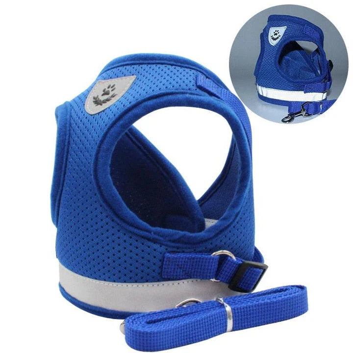Reflective and breathable pet harness in blue color with adjustable straps and mesh design for safety and comfort