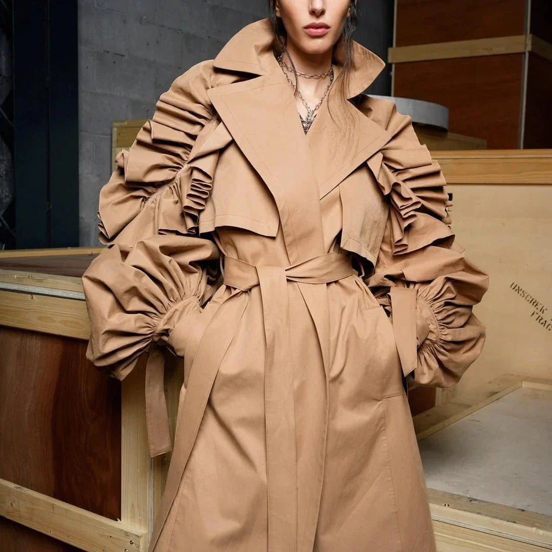 Frill Trim Windbreaker in Khaki color, featuring a turn-down collar and ruffle trim details for a sophisticated and timeless look.