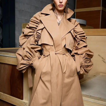 Frill Trim Windbreaker in Khaki color, featuring a turn-down collar and ruffle trim details for a sophisticated and timeless look.