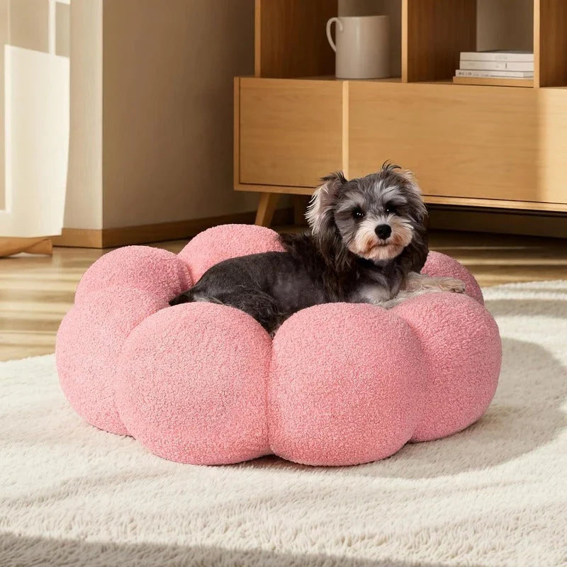 A cozy, flower-shaped dog bed made of soft, plush teddy sherpa fabric with raised edges for head and neck support, providing a calming and comfortable resting spot for medium-sized dogs.