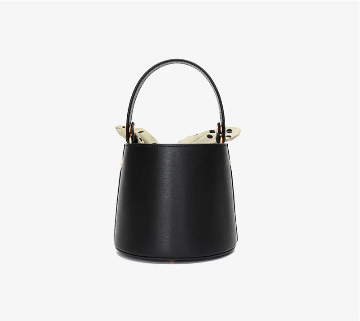 Premium leather bucket bag tote with bow-type closure, exquisite golden hardware, and versatile design