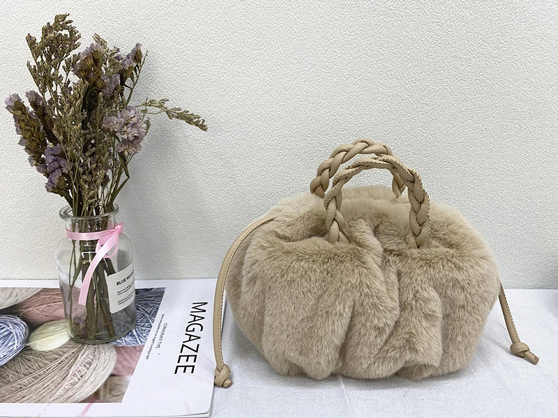 Elegant pleated leather and mink fur handbag in various colors, featuring a chic and modern cloud-like design