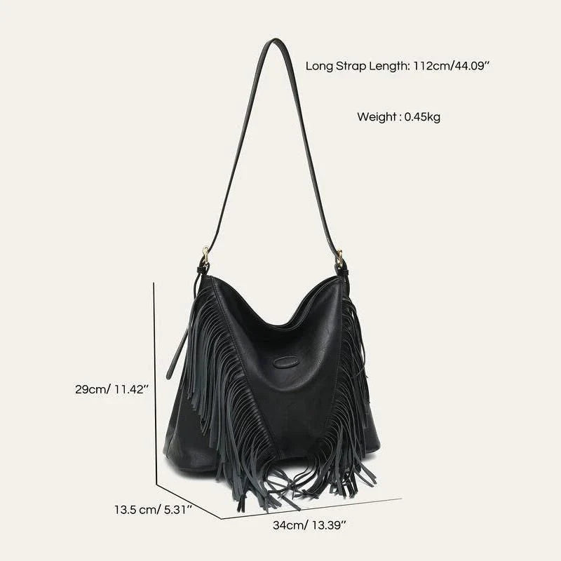 Chic vegan leather shoulder bag with tassel decoration, featuring a spacious interior and versatile carrying options