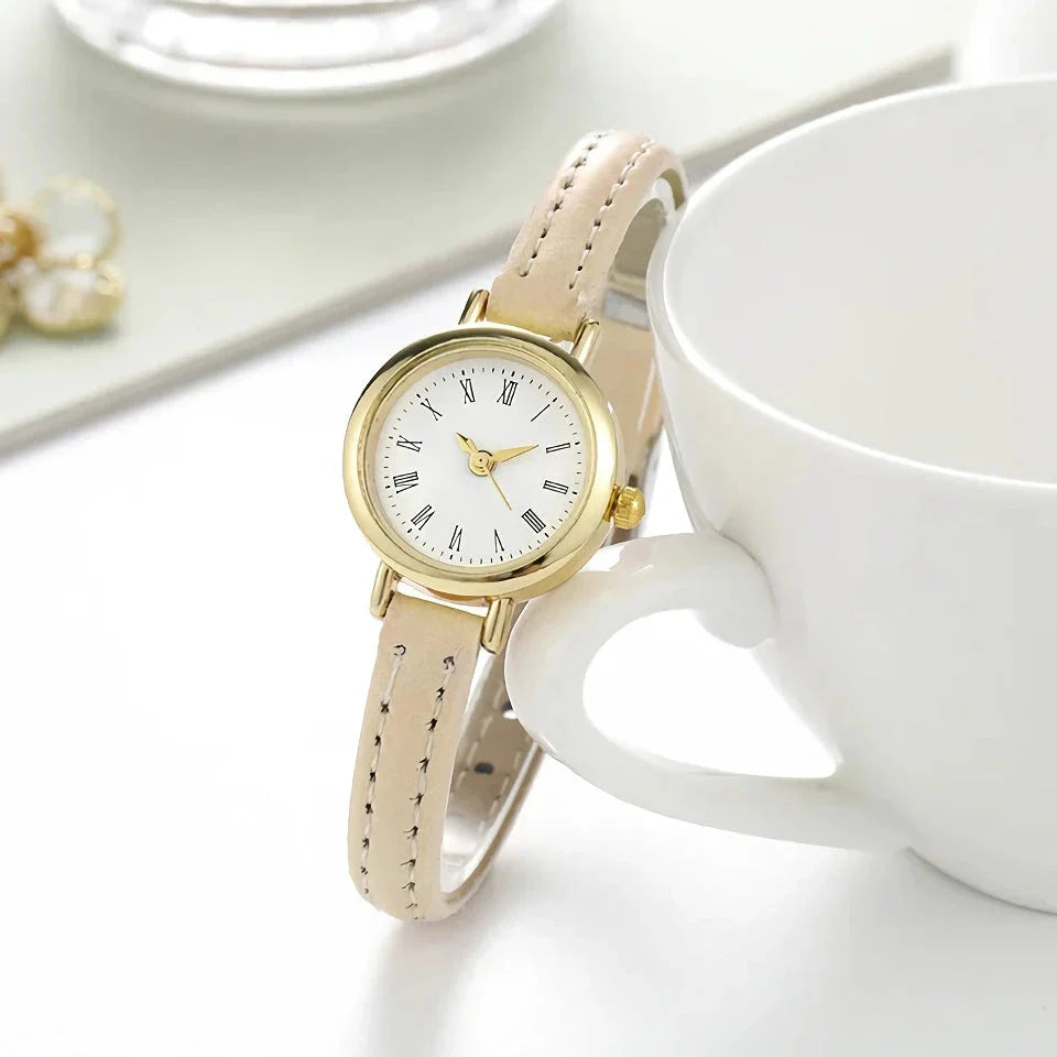 Elegant women's quartz leather wristwatch with a minimalist, timeless design